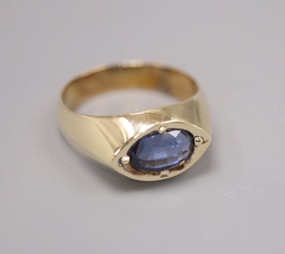 A 14ct gold and sapphire dress ring, size Q, gross 7.8 grams